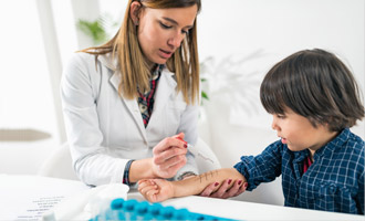 Physician examining a child